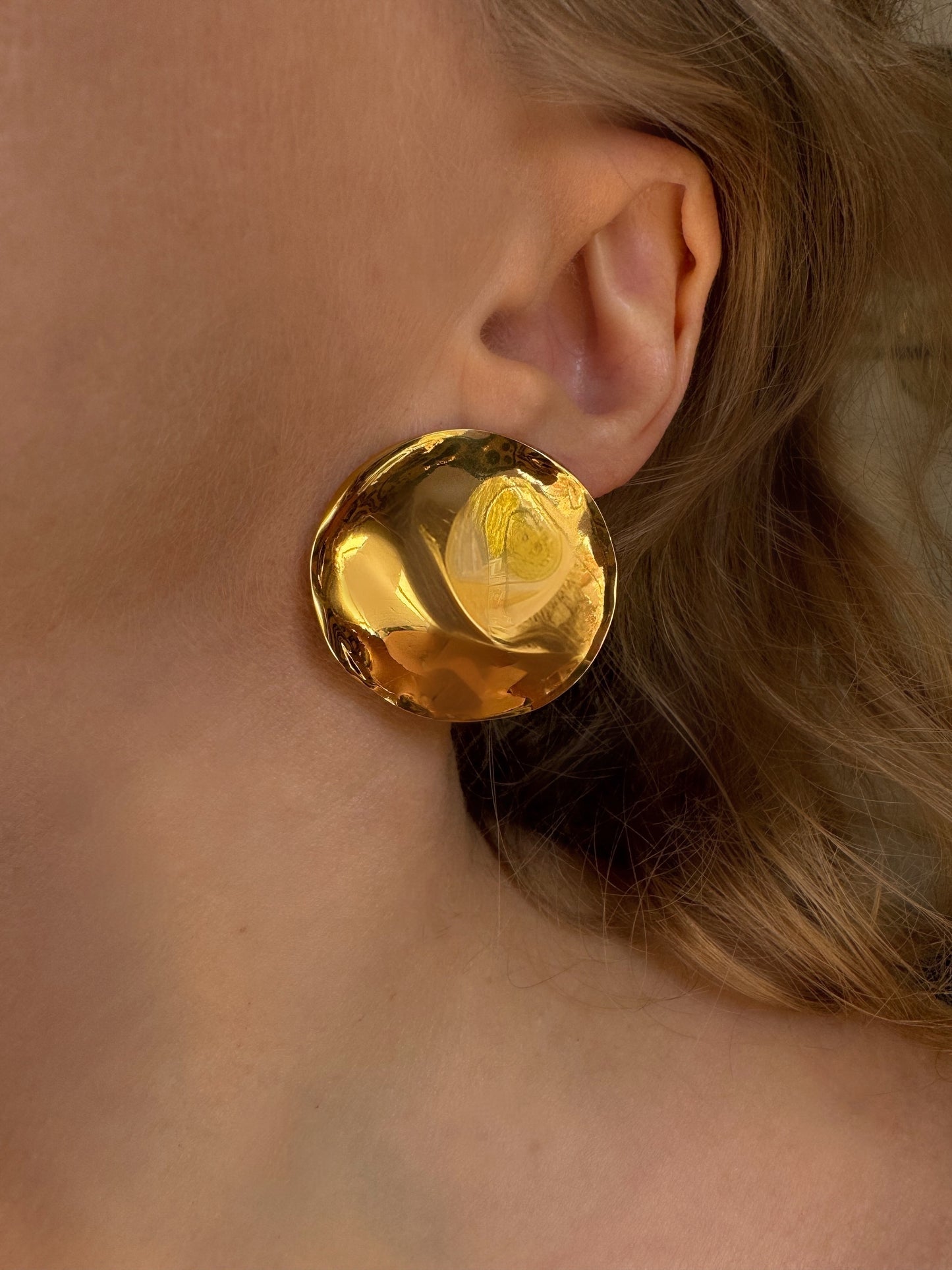 Boucles d'oreilles rondes irrégulières