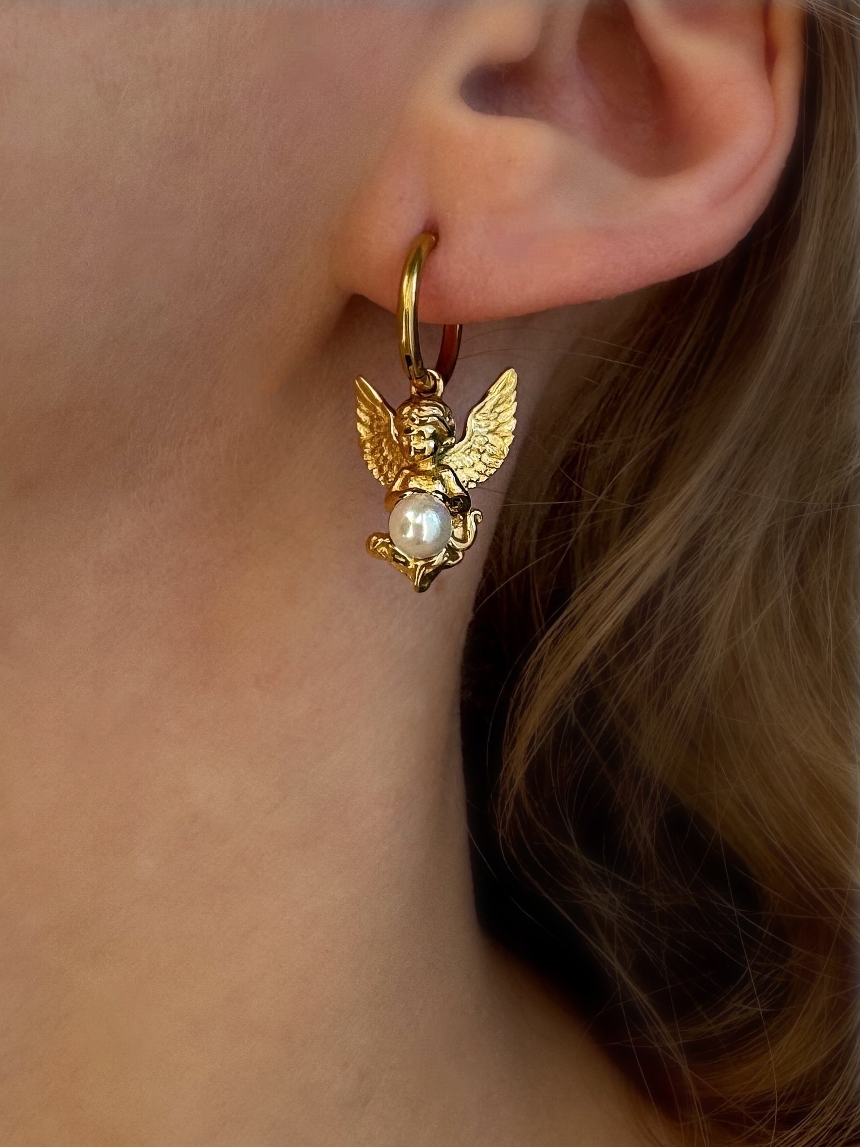 Dangle hoop earrings with Angel shape charms and cultivated pearls